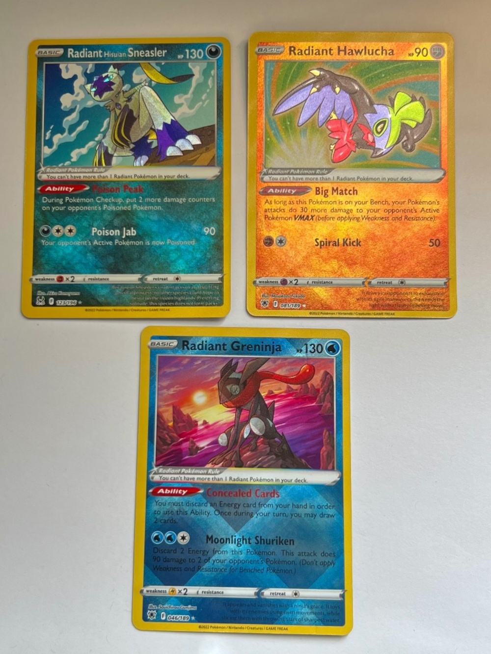 3 Pokemon Cards: Radiant Greninja, Radiant Hisuian Sneasler, Radiant Hawlucha